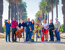 City of Riverside Staff standing in front of Palm trees 